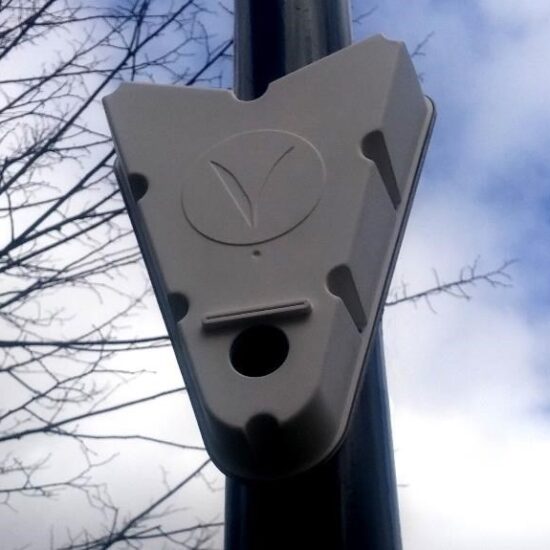 One of the triangle-shaped Vivacity Labs Ltd sensors on a lamppost