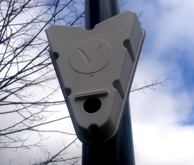 One of the triangle-shaped Vivacity Labs Ltd sensors on a lamppost