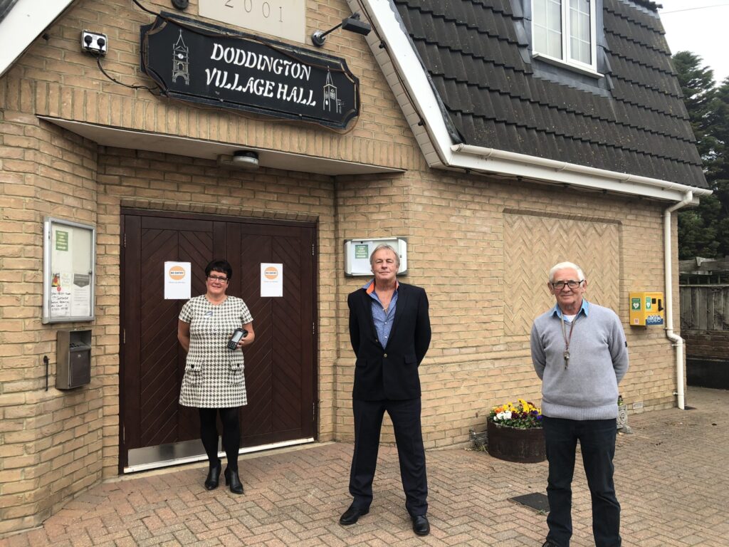 Dawn Breacher, Cllr David Connor and hall caretaker Stephen Marshall standing outside Doddington Village hall