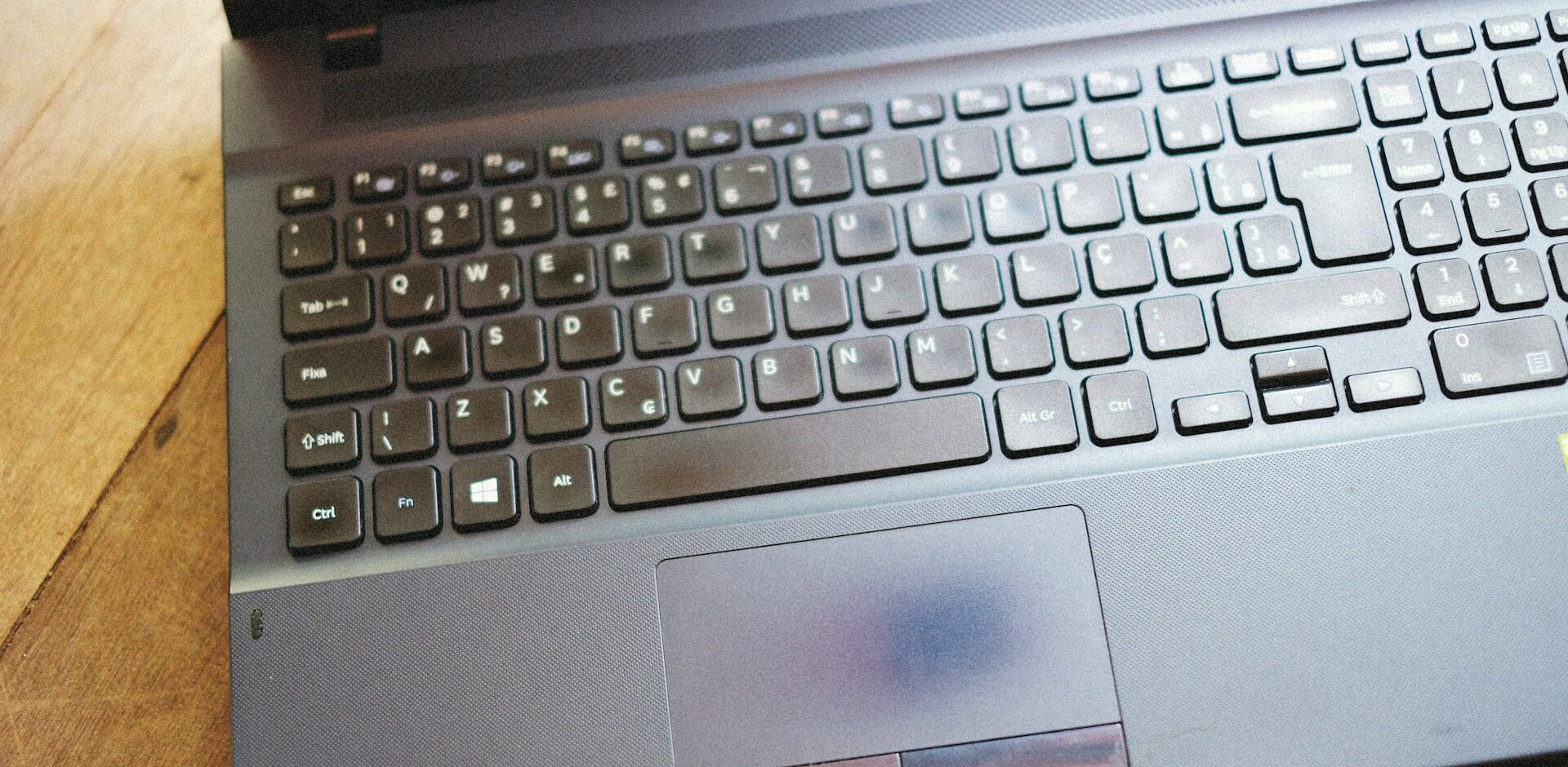 Photo of an old laptop by Alexey Demidov on Unsplash